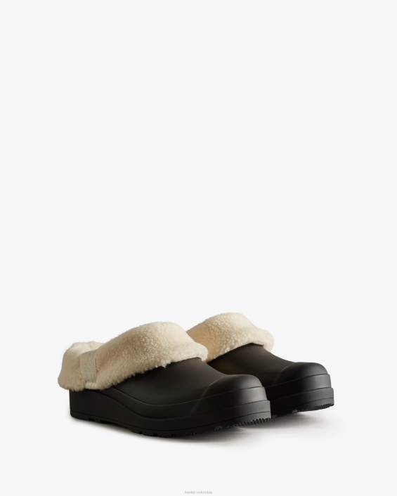 mujer jugar zuecos aislados de piel de oveja vegana 6284258 Hunter