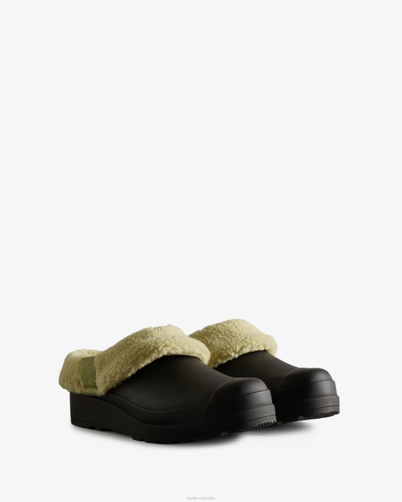 mujer jugar zuecos aislados de piel de oveja vegana 6284260 Hunter
